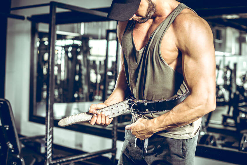 adult bodybuilder wearing leather lifting belt