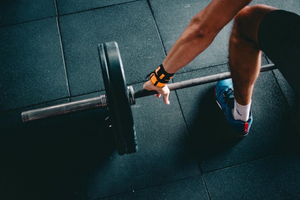 men lifting and wearing CrossFit Reebok Nano 6 shoes