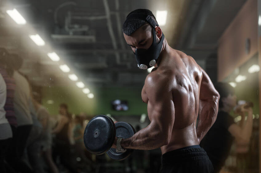 Workout at gym with elevation training mask 