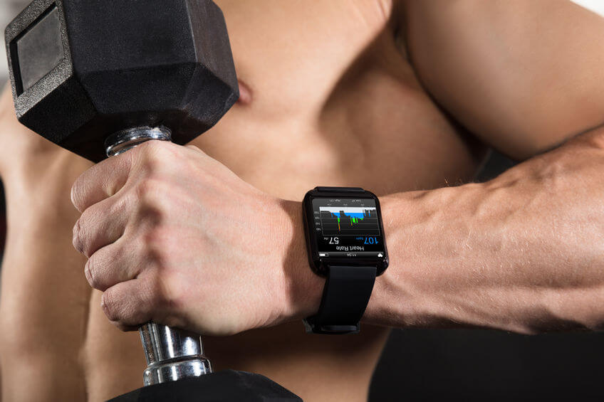 Athlete Man Wearing Smart Watch in Gym