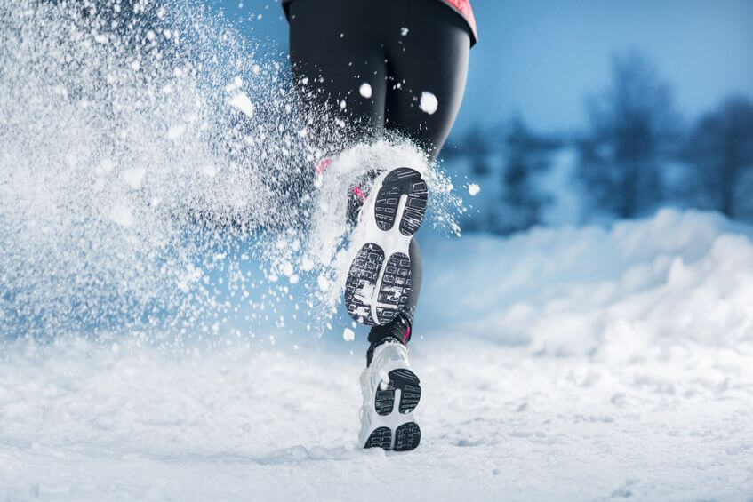 woman is running during winter