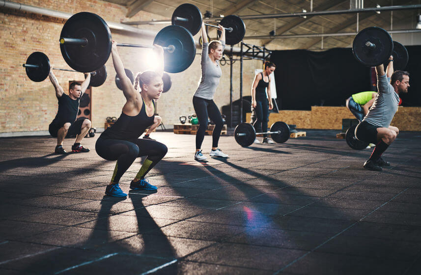 group of athletes in CrossFit gym