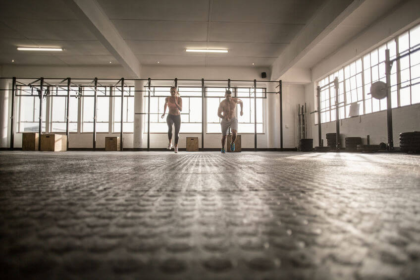 two people start a running in CrossFit gym