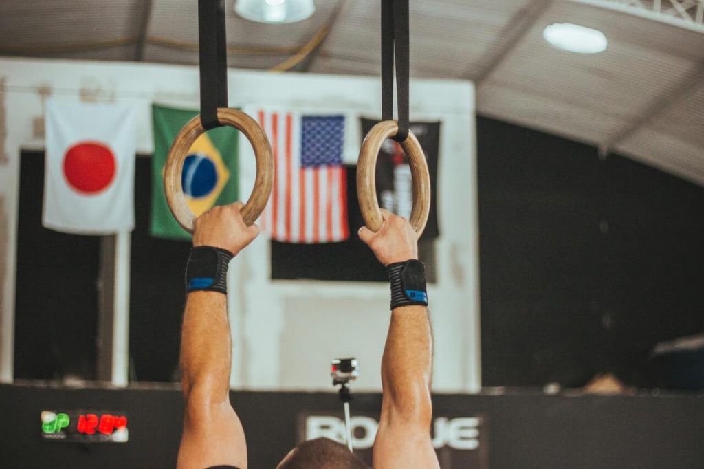 gymnast workout with gymnastic rings