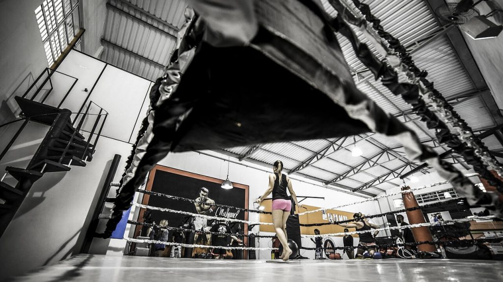 woman training in boxing ring