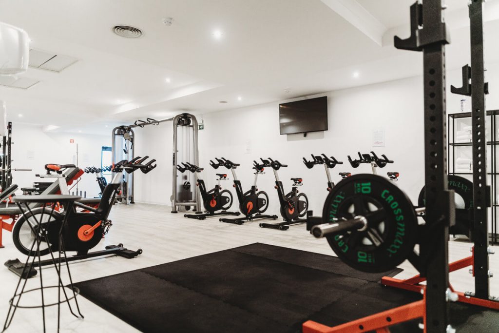 empty commercial gym with gym equipment