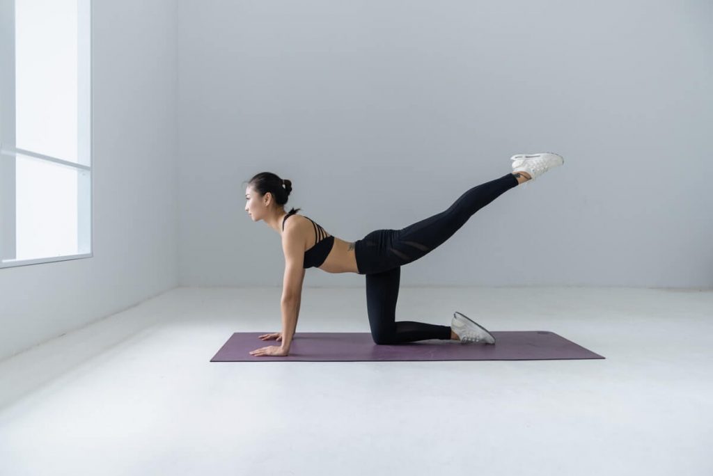 active woman doing yoga exercise