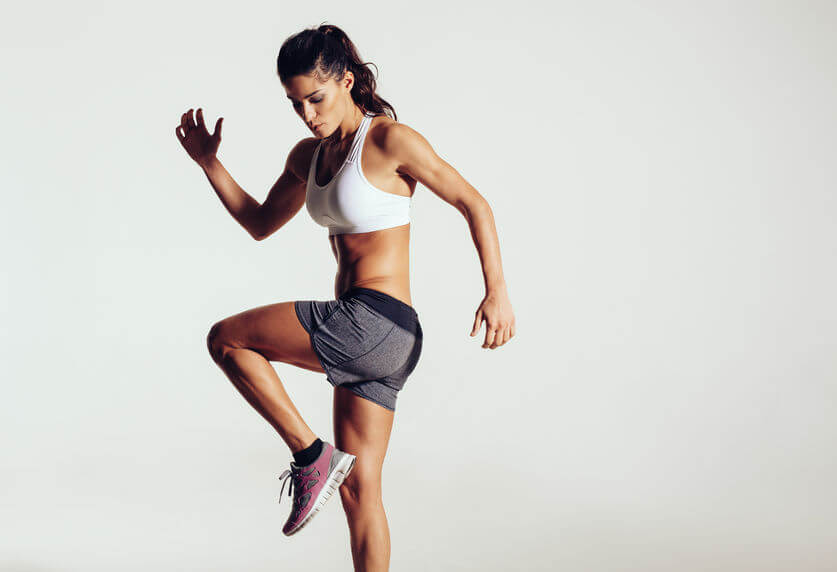 female athlete doing fitness workout at gym