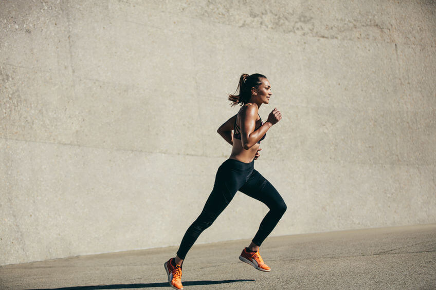 young woman running in morning outdoor