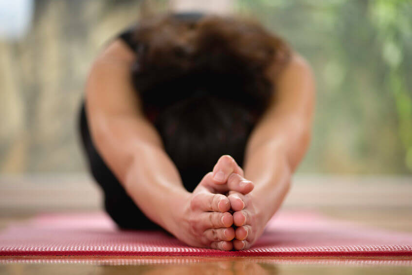 woman doing hot yoga