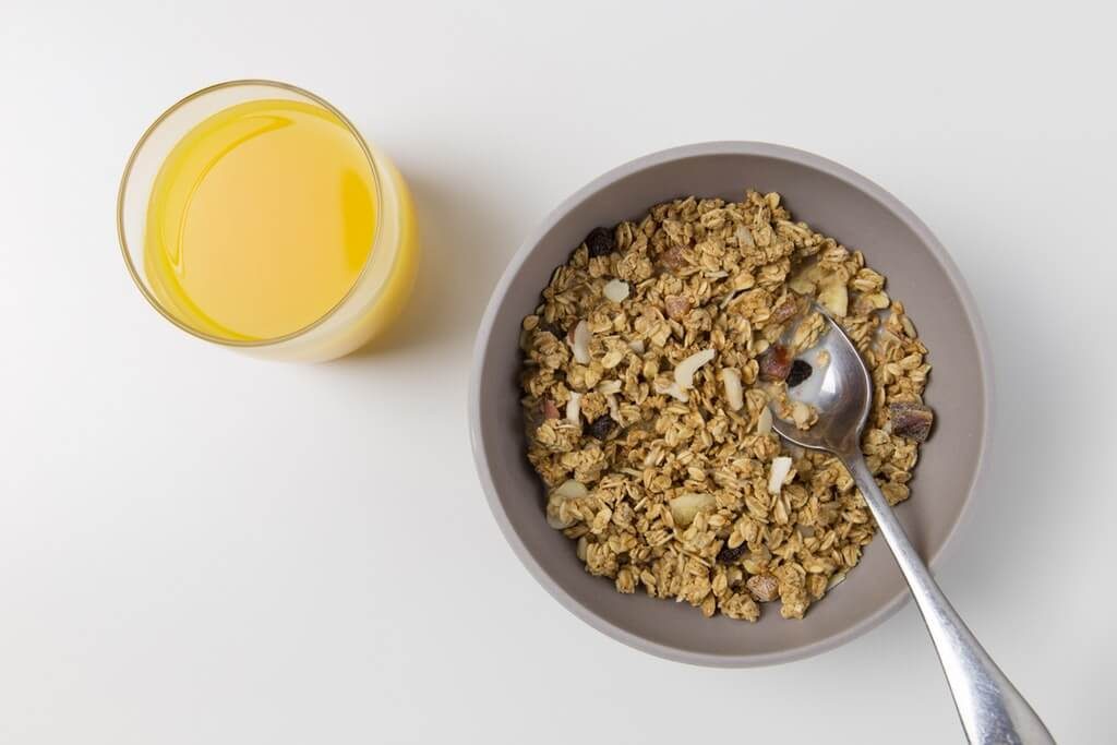 oats and nuts in grey bowl