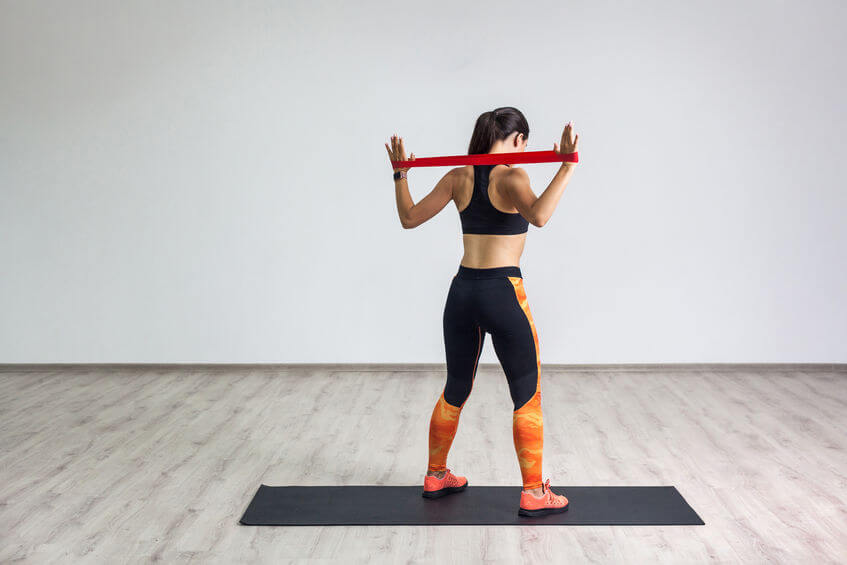 woman workout with resistance bands