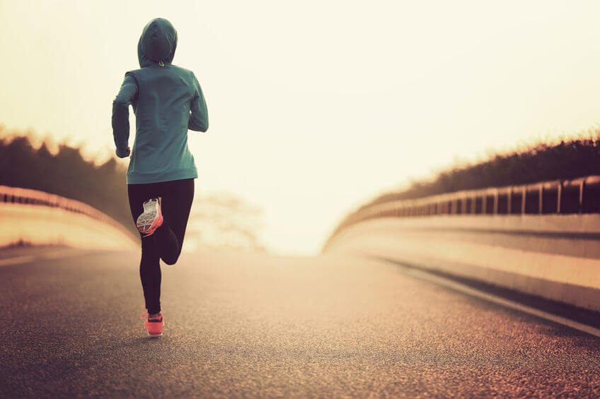 fitness woman runner athlete running at road