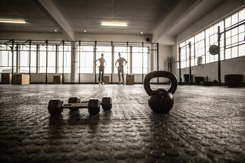 kettlebell and dumbbell in CrossFit gym