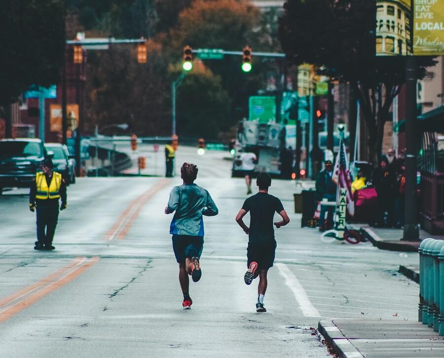 two men running marathon